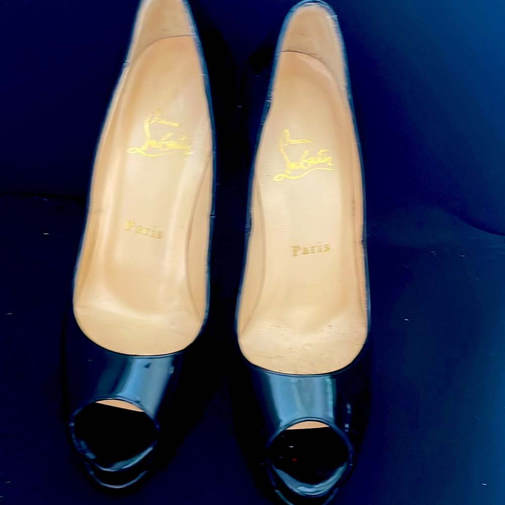 Christian Louboutin patent leather heels.Perfect, scuffs on bottom size 7USA